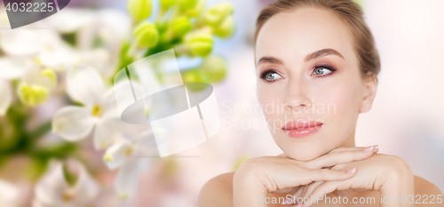 Image of beautiful young woman face and hands