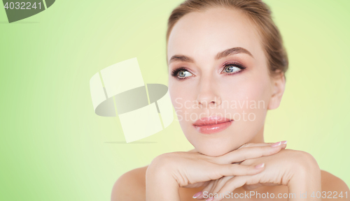 Image of beautiful young woman face and hands