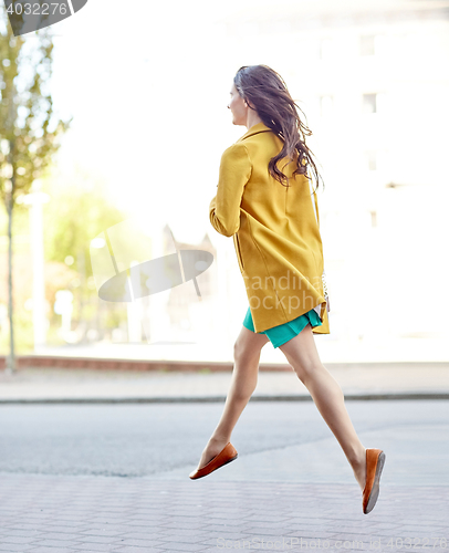 Image of young woman or teenage girl legs on city street