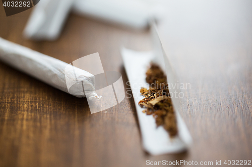 Image of close up of marijuana joint and tobacco