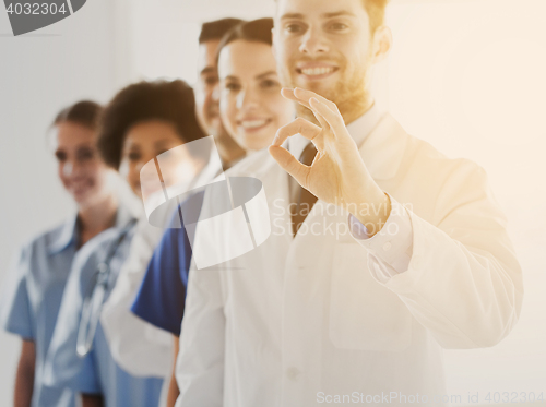 Image of close up of doctors showing ok sign at hospital