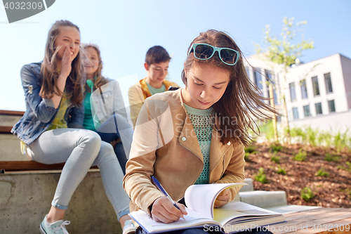 Image of student girl suffering of classmates mockery