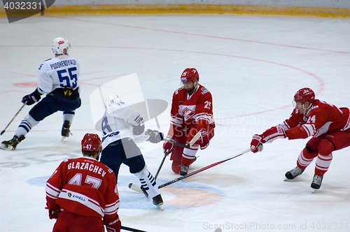 Image of Alexander Mereskin (25) cover the puck