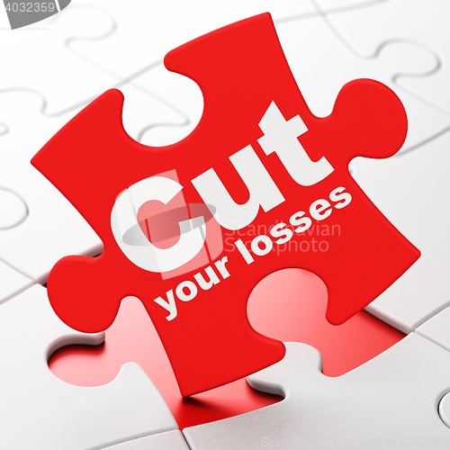 Image of Business concept: Cut Your losses on puzzle background