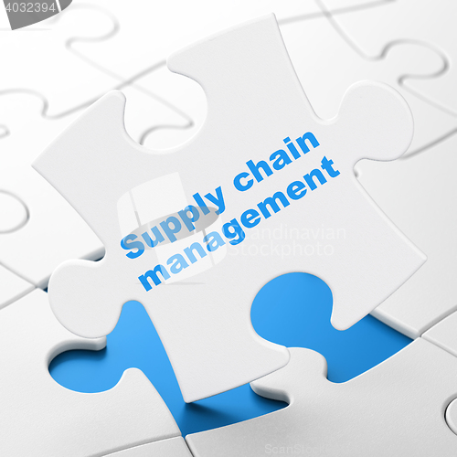 Image of Marketing concept: Supply Chain Management on puzzle background