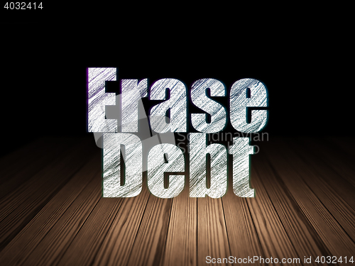 Image of Business concept: Erase Debt in grunge dark room