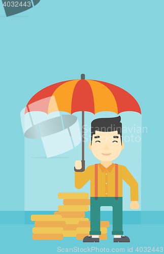 Image of Businessman with umbrella protecting money.