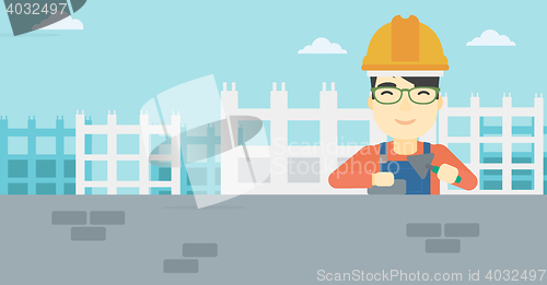 Image of Bricklayer with spatula and brick.