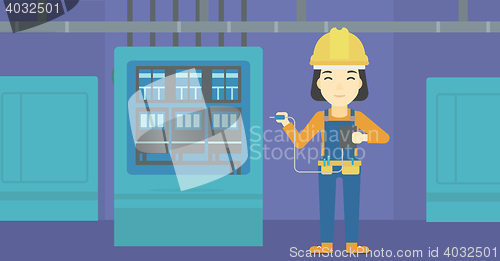 Image of Electrician with electrical equipment.