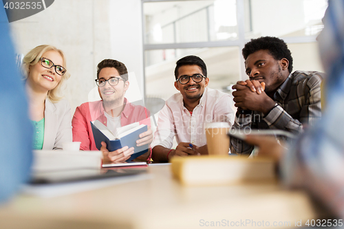 Image of group of high school students sitting at table