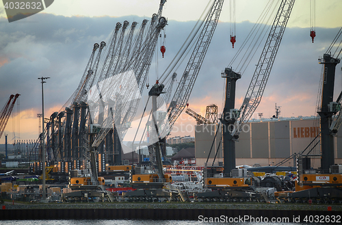Image of ROSTOCK, GERMANY - AUGUST 14, 2016: Container terminal and crane