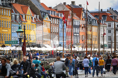 Image of Copenhagen, Denmark – August  14, 2016: Boats in the docks Nyh