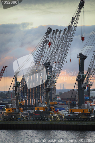 Image of ROSTOCK, GERMANY - AUGUST 14, 2016: Container terminal and crane