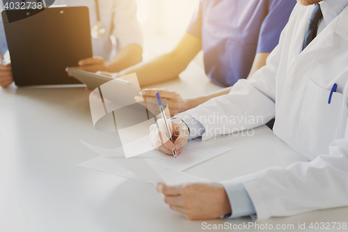 Image of close up of happy doctors at seminar or hospital