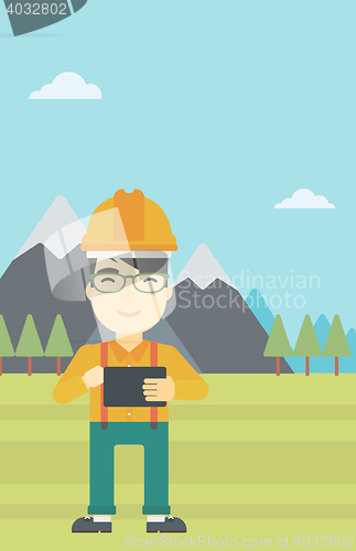 Image of Man holding tablet computer vector illustration.