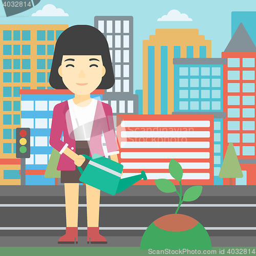 Image of Woman watering tree vector illustration.