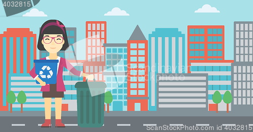 Image of Woman with recycle bin and trash can.
