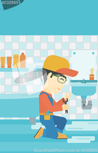 Image of Man repairing sink.