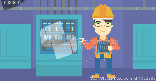 Image of Electrician with electrical equipment.