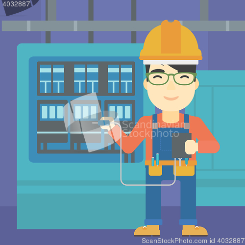 Image of Electrician with electrical equipment.