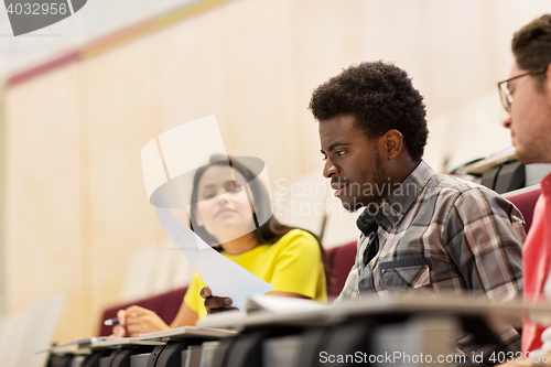 Image of international students with test on lecture
