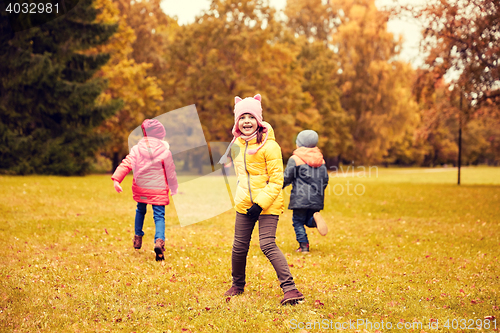 Image of group of happy little kids running outdoors