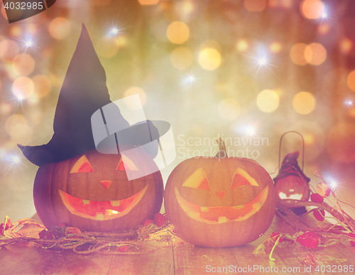 Image of close up of carved halloween pumpkins on table