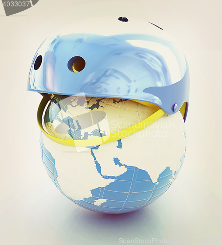 Image of Bicycle helmet on earth. The concept of healthy life and sport. 