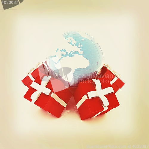Image of Traditional Christmas gifts and earth. Global holiday concept . 