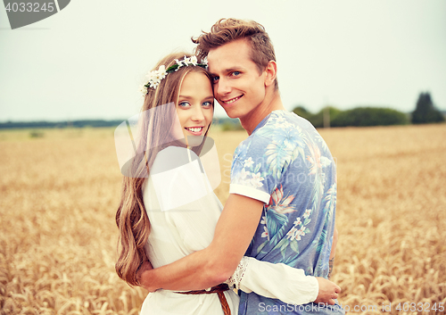 Image of happy smiling young hippie couple outdoors