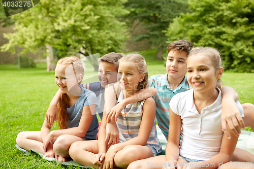Image of group of happy kids or friends outdoors