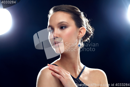 Image of beautiful young asian woman with earring