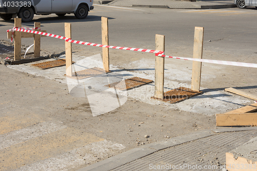 Image of Installing spillway gratings on the road