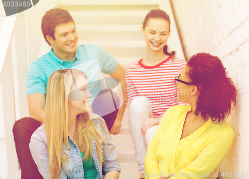 Image of smiling teenagers hanging out