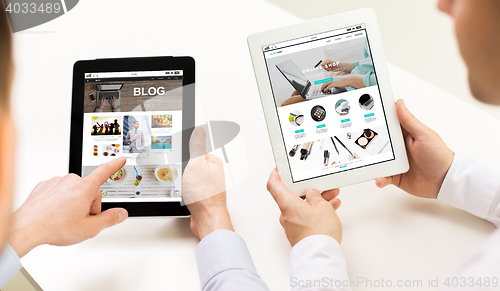 Image of close up of businessman hands with tablet pc