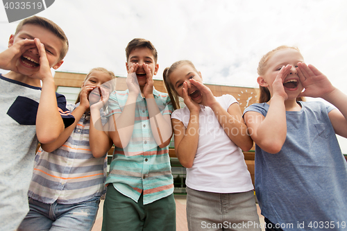 Image of group of happy elementary school students