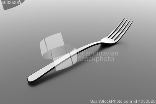 Image of Silver fork on grey background