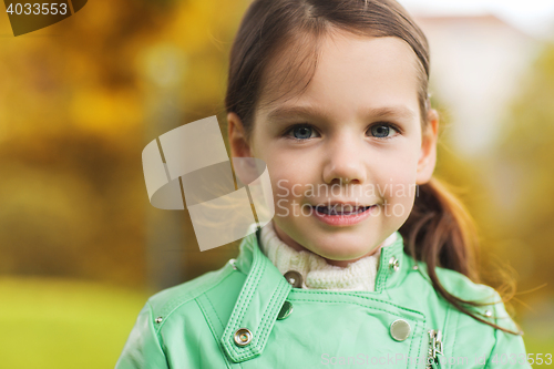 Image of happy beautiful little girl portrait outdoors