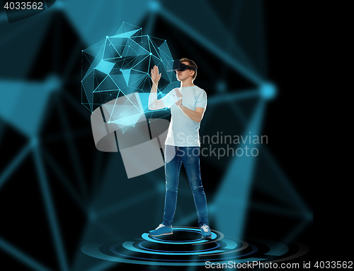 Image of happy man in virtual reality headset or 3d glasses