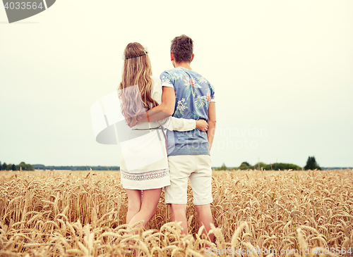 Image of happy smiling young hippie couple outdoors