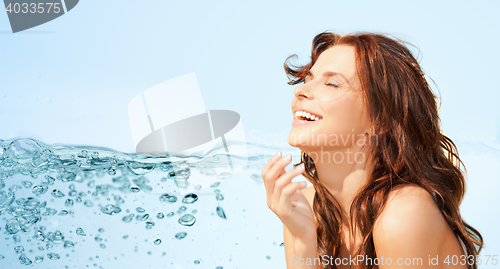 Image of happy beautiful woman over lights background