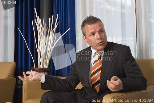 Image of Businessman talking