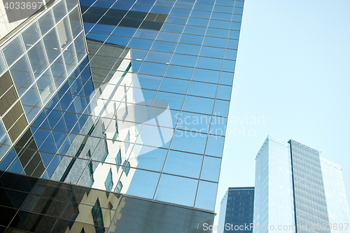 Image of close up of office building or skyscraper and sky