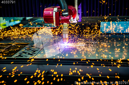 Image of CNC Laser plasma cutting of metal, modern industrial technology.