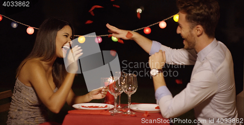 Image of Man makes flying gesture with right hand