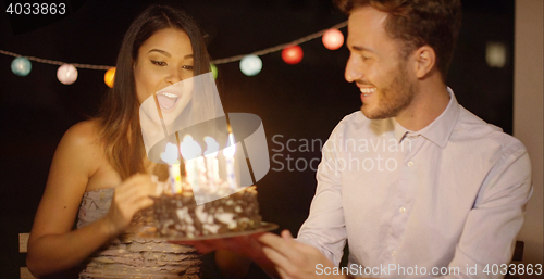 Image of Pretty young woman celebrating her birthday