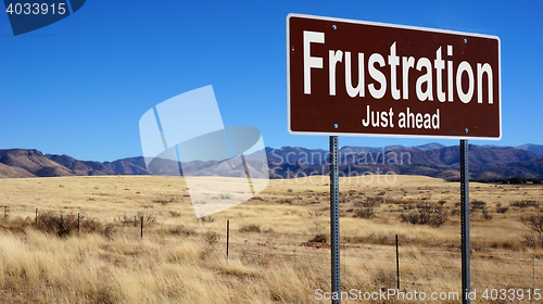 Image of Frustration brown road sign