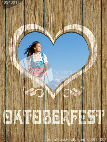 Image of wooden heart woman octoberfest