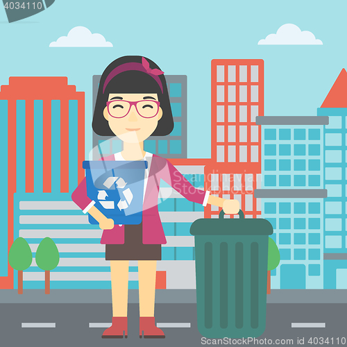 Image of Woman with recycle bin and trash can.