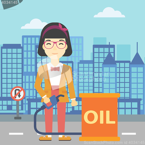 Image of Woman with oil barrel and gas pump nozzle.